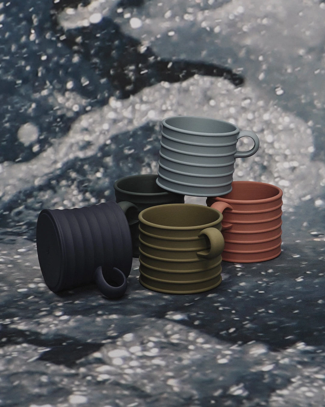 Four tonal pairs of JW Anderson x Wedgwood mugs, matte on one half, ribbed on the other