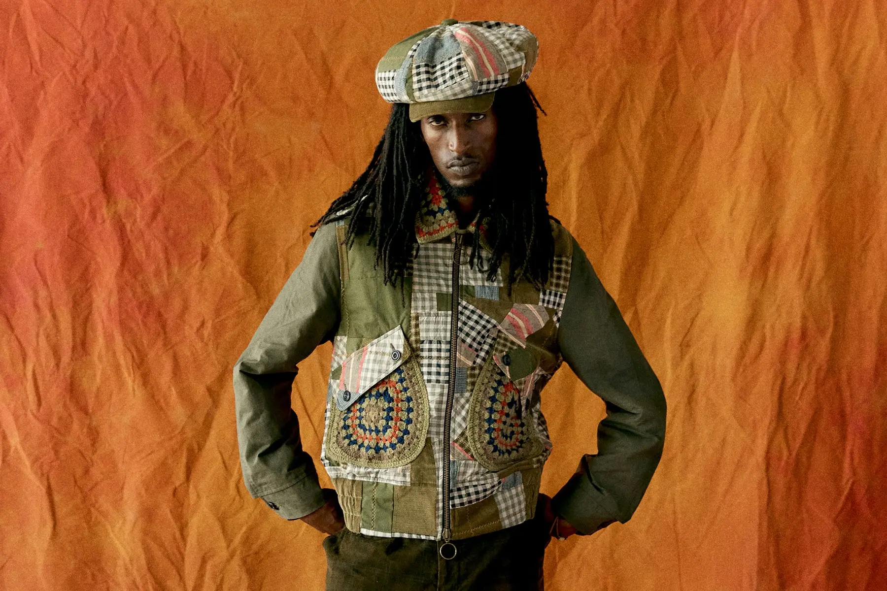Nicholas Daley SS27 Sonic Tapestry collection lookbook image showing handwoven rust jacket with visible texture
