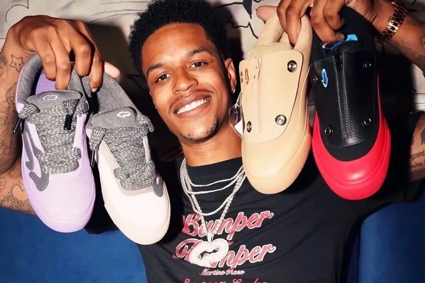 Sneaker silhouettes from the Shareef by Shaq collection displayed on a preview table at New York Fashion Week